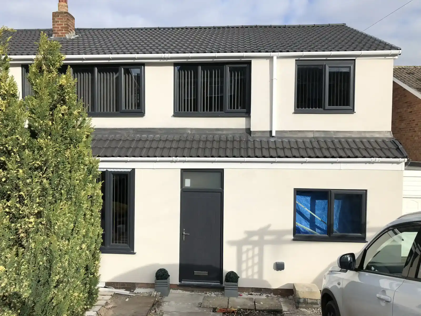 Completed monocouche scraped render on detached property in Dronfield S18, Sheffield — P&R Solutions
