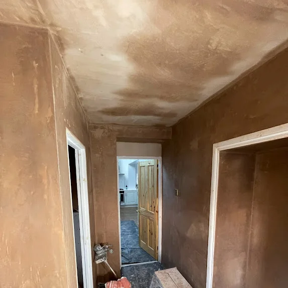 Hallway in High Green S35 after artex ceilings were removed, new plasterboard fixed and ceiling and walls skimmed