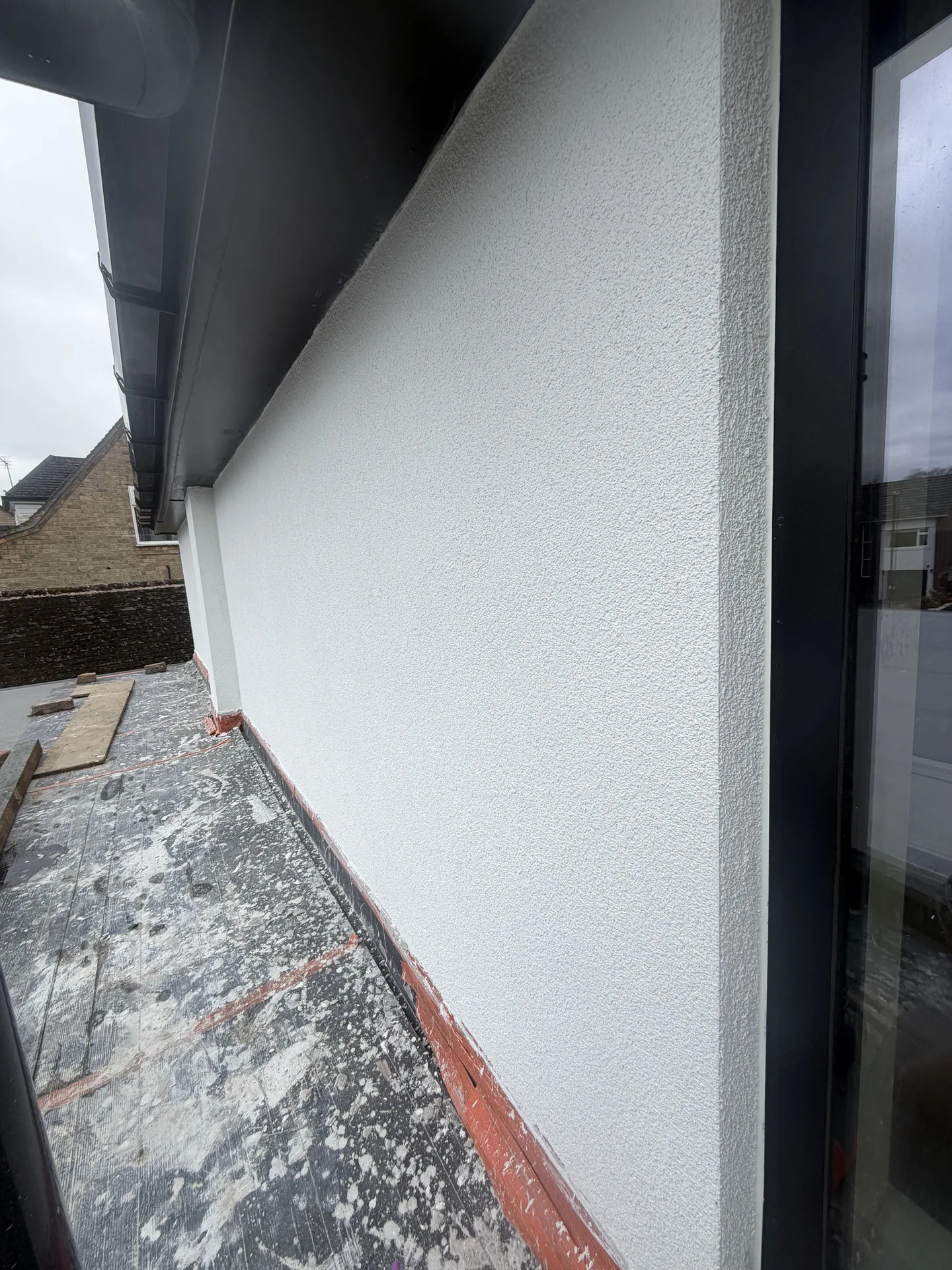 Stage 4f: Side elevation in Ecorend Marble White from scaffold level — Sandygate Sheffield by P&R Solutions