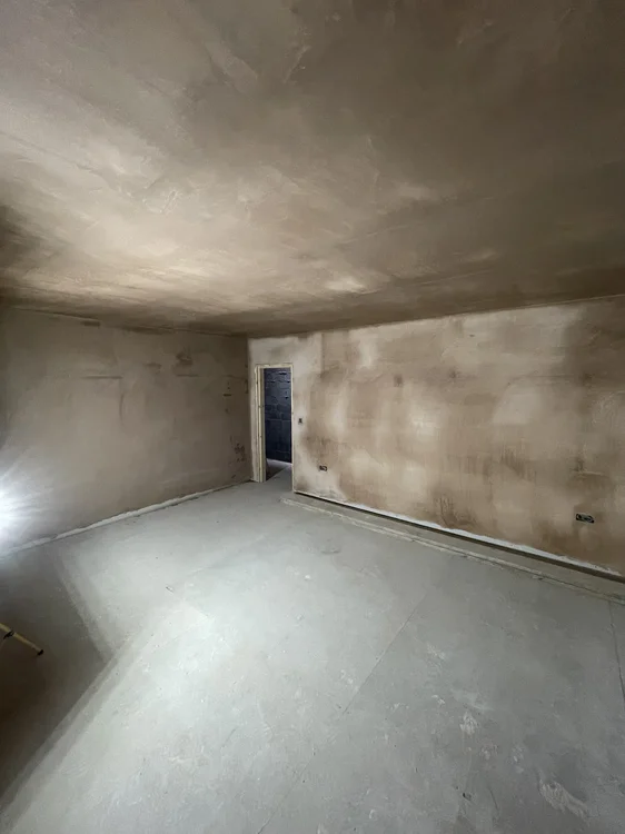 Full room replastering Sheffield — two-coat bonding and finish skim applied to walls and ceiling, perfectly smooth and ready for decorating, by P&R Solutions Sheffield plasterers