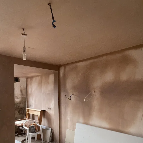 Living room in Walkley S6 after a ceiling crack was repaired and the ceiling and walls re-skimmed