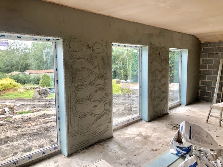 Float and skim plastering at Wentworth S62 Sheffield — bonding coat applied and ruled flat, then finish skimmed to a smooth, hard surface by P&R Solutions plasterers
